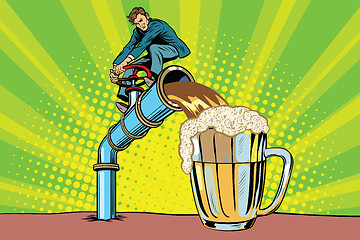 Image showing Man pours beer