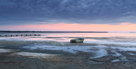 Image showing Little dinghy in the shallows