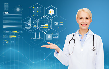 Image showing happy doctor with stethoscope and charts over blue