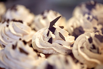 Image showing close up of cupcakes or muffins with frosting