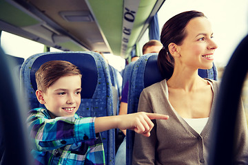 Image showing happy family riding in travel bus