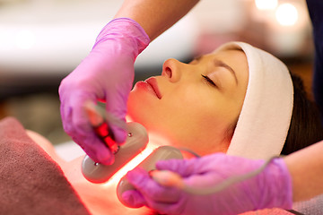 Image showing young woman having face microdermabrasion at spa