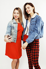 Image showing best friends teenage girls together having fun, posing emotional on white background, besties happy smiling, lifestyle people concept