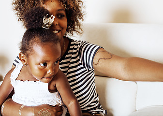 Image showing adorable sweet young afro-american mother with cute little daugh