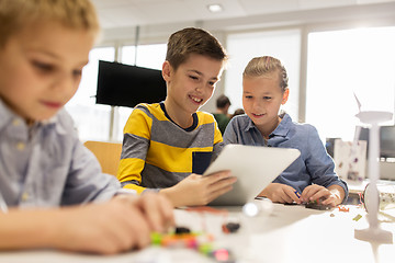 Image showing kids with tablet pc programming at robotics school