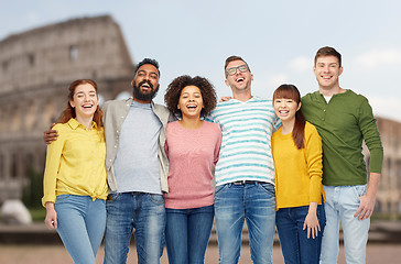 Image showing international group of happy people over coliseum