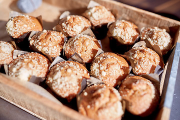 Image showing close up of muffins in wooden box