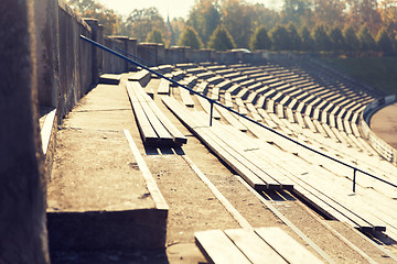 Image showing close up of bleachers with benches on stadium