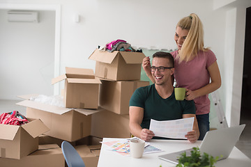 Image showing Young couple moving in a new home