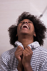 Image showing beautiful black woman wearing  bathrobe