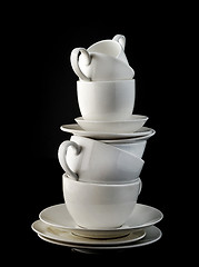 Image showing stack of white coffee cups and plates