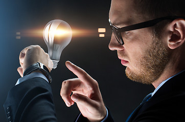 Image showing close up of businessman with smart watch