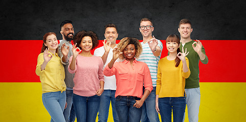 Image showing international people showing ok over german flag