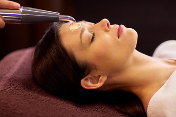 Image showing woman having hydradermie facial treatment in spa