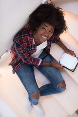 Image showing black woman using her electronic tablet