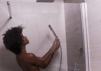 Image showing African American woman in the shower