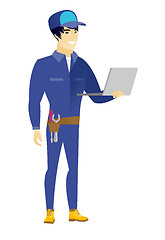 Image showing Mechanic using laptop vector illustration.