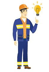 Image showing Builder pointing at bright idea light bulb.