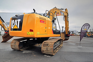 Image showing Cat 320 E Hydraulic Excavator on Asphalt Yard