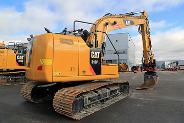 Image showing Cat 318FL Hydraulic Excavator on a Yard