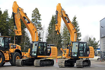 Image showing Cat Hydraulic Excavators on a Yard