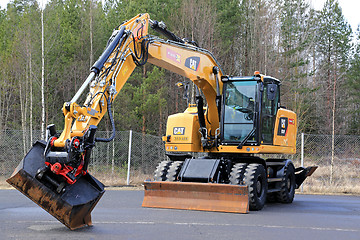 Image showing Cat M318F Wheeled Excavator on Asphalt Yard