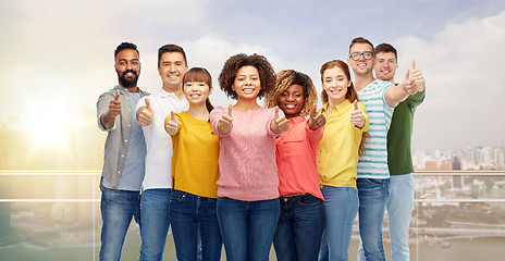 Image showing international group of people showing thumbs up