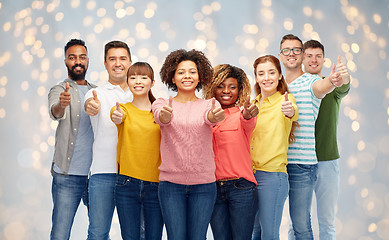 Image showing international group of people showing thumbs up