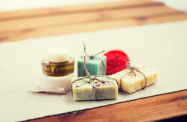 Image showing close up of handmade soap bars on wood