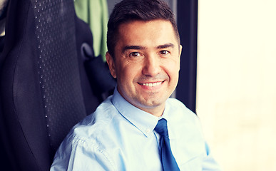 Image showing close up of happy bus driver or businessman