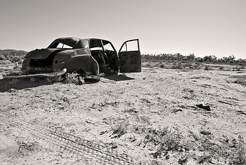 Image showing old rusty car in the desert