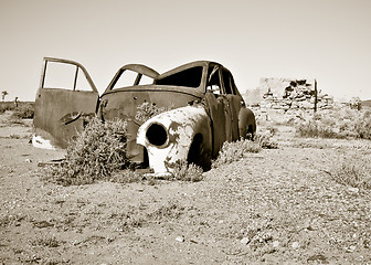 Image showing old rusty car in the desert