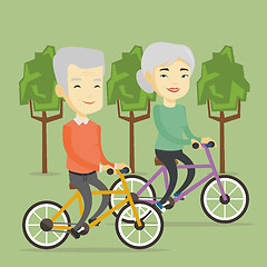 Image showing Senior couple riding on bicycles in the park