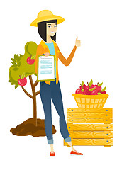 Image showing Farmer with clipboard giving thumb up.