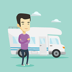 Image showing Man standing in front of motor home.