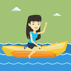 Image showing Tourists riding a banana boat vector illustration.