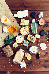 Image showing close up of body care cosmetic products on wood