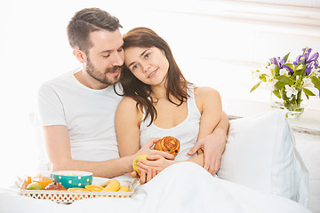 Image showing Relaxed Couple in Bed in bedroom at home