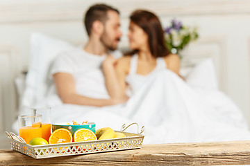 Image showing Relaxed Couple in Bed in bedroom at home