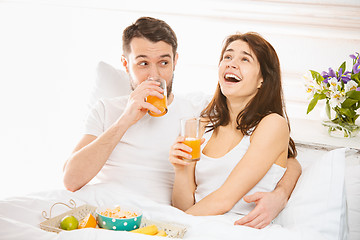 Image showing Relaxed Couple in Bed in bedroom at home