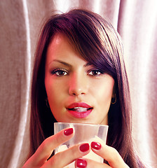 Image showing face and glass of whisky