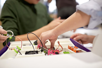 Image showing children with building kit at robotics school