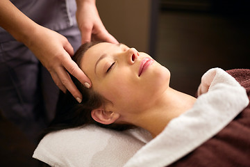 Image showing woman having head massage at spa