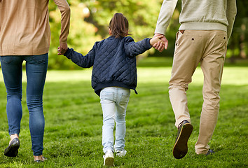 Image showing happy family walking in summer park