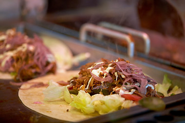 Image showing tortilla wraps cooking at street market