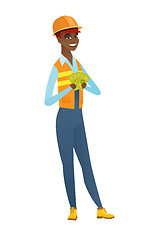 Image showing Happy african-american builder holding money.