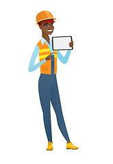 Image showing African-american builder holding tablet computer.