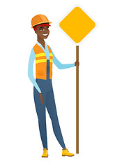 Image showing African-american road worker showing road sign.