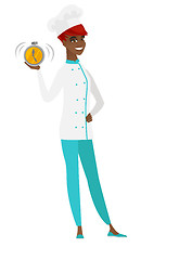 Image showing African-american chef cook holding alarm clock.
