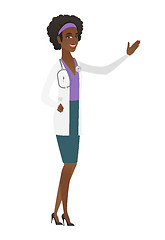 Image showing African-american doctor showing a direction.